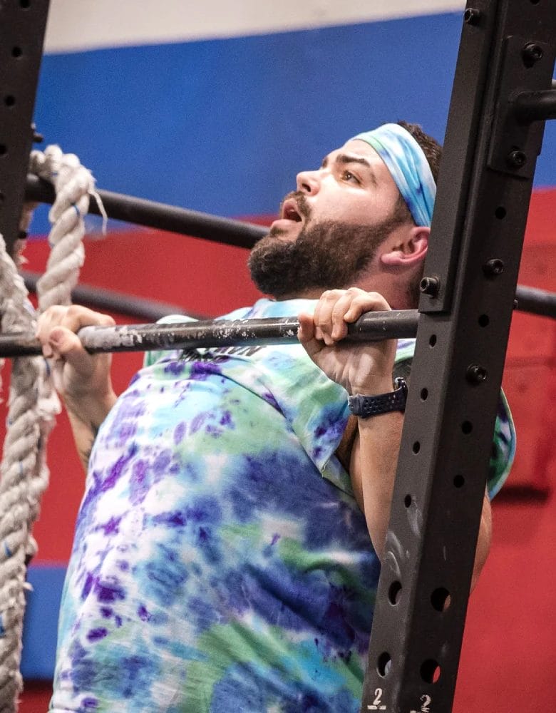Man performing pull-ups at EverProven Training and CrossFit