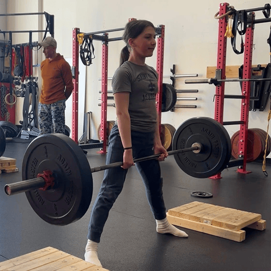 teen lifting weights at EverProven Training and CrossFit